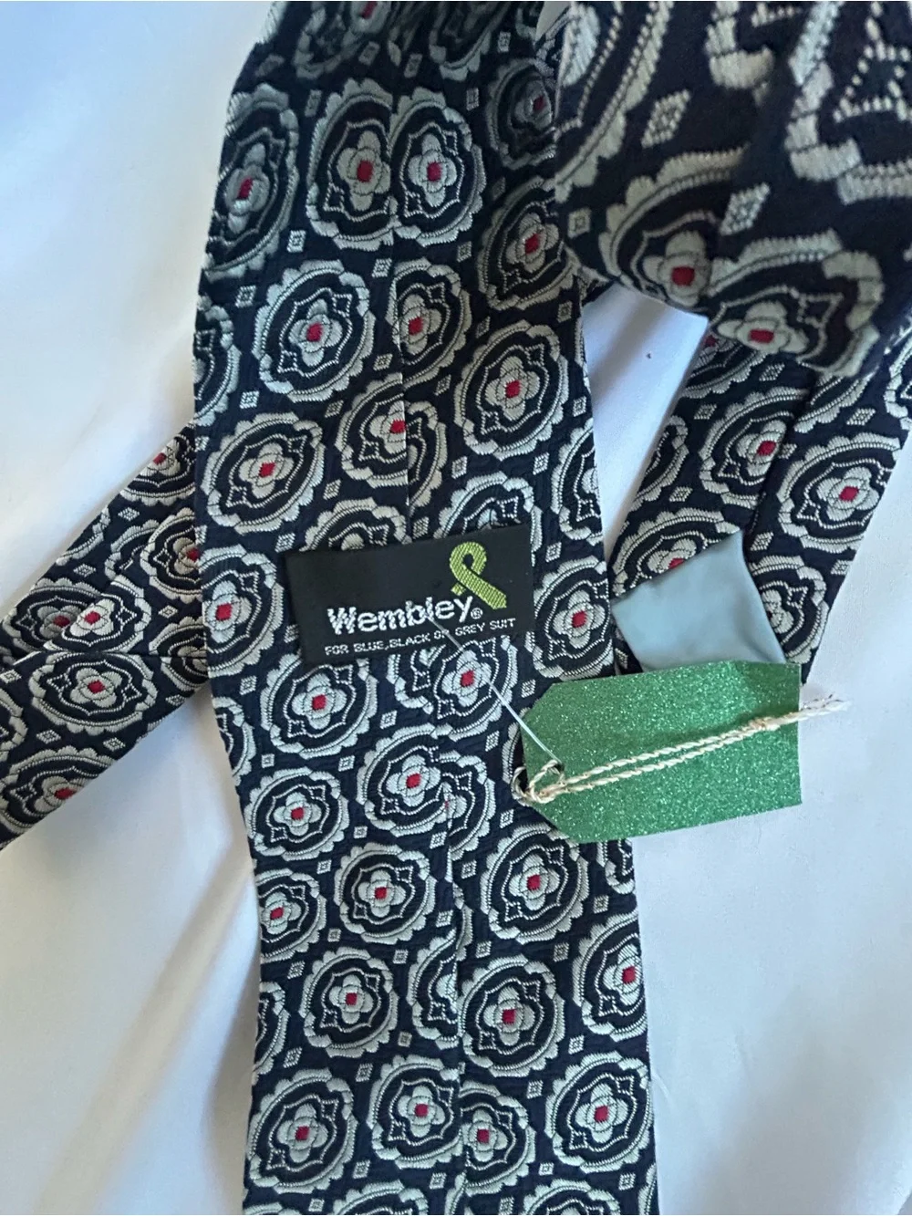 Wembley Black Medallion Pattern Tie with Red Accents